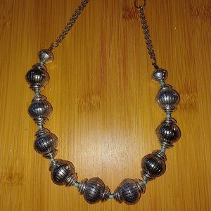 Grayish, metal-like beaded necklace